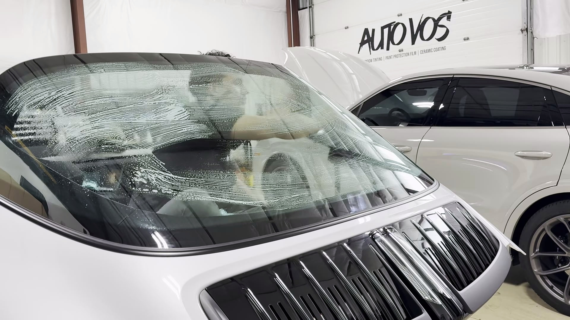 Scrub the entire inside surface of the rear glass Scrubber working across the inside of the Targa rear glass