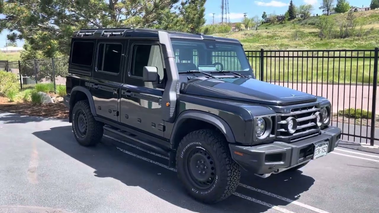 Dark gray INEOS Grenadier with window tint and paint protection film, shown in the Auto Vos project video