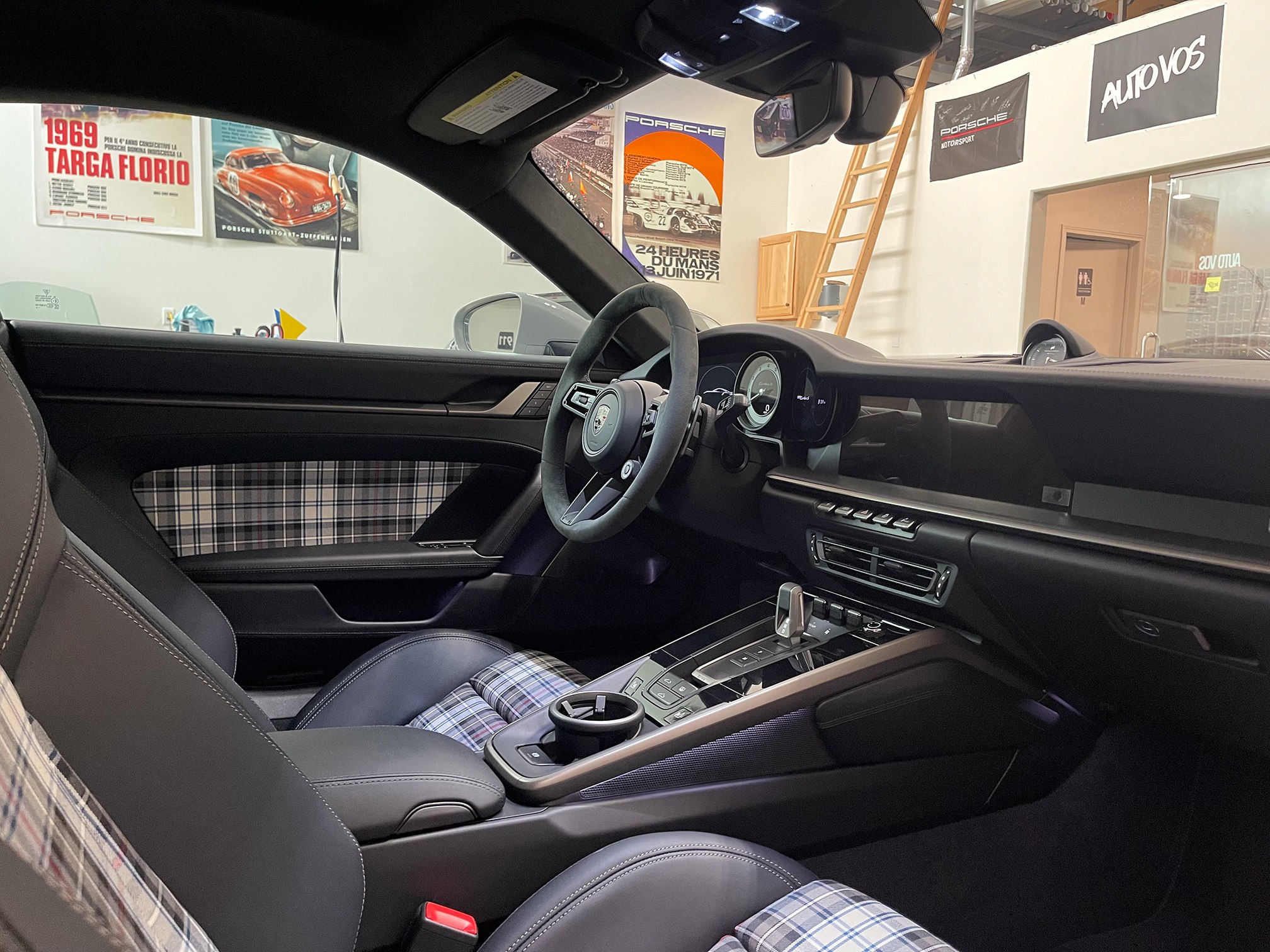 A close interior view across the dashboard and front seats A close interior view across the dashboard and front seats.