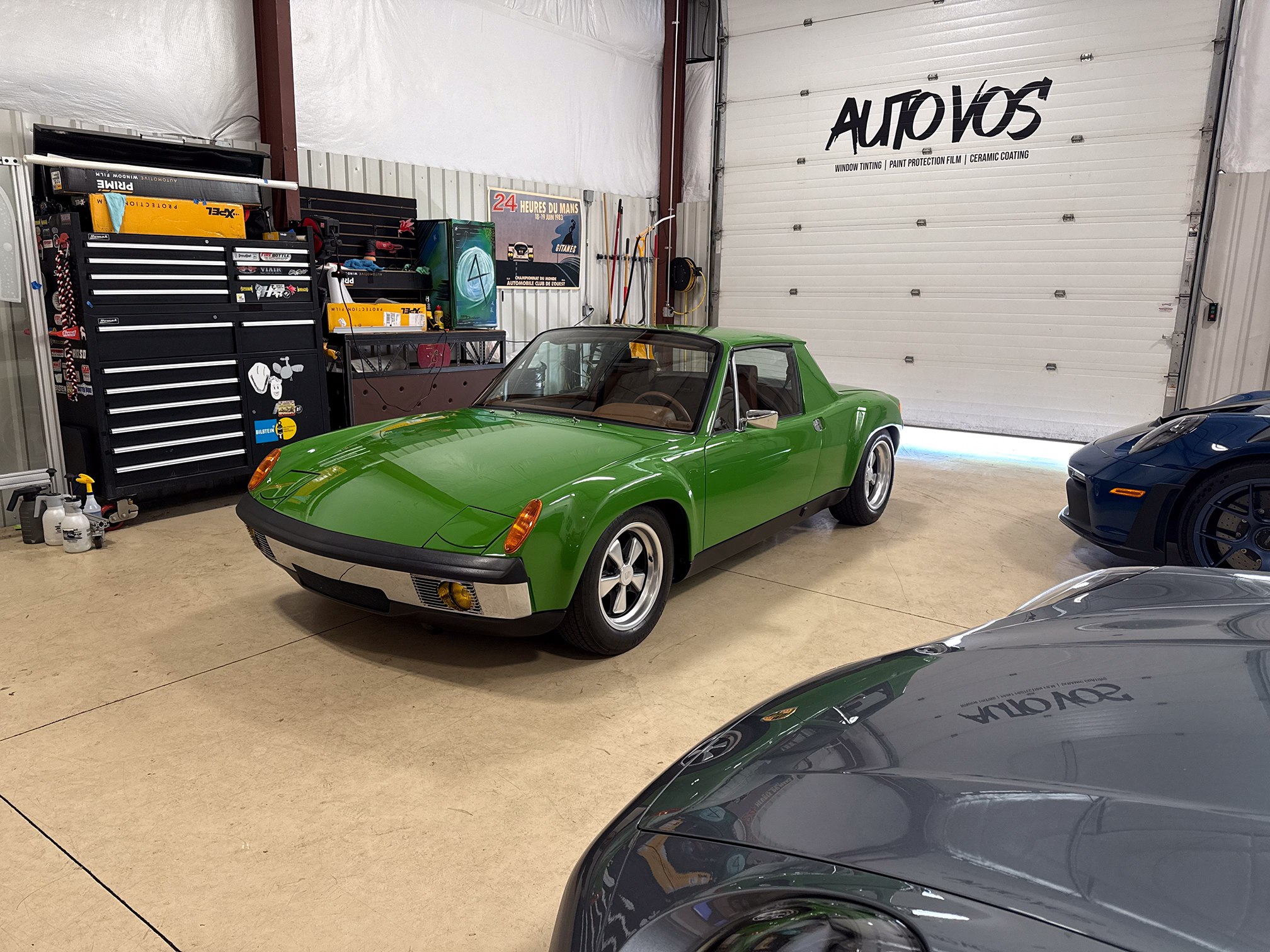 Green Porsche 914 with a black roof in the workshop Green Porsche 914 with a black roof in the workshop