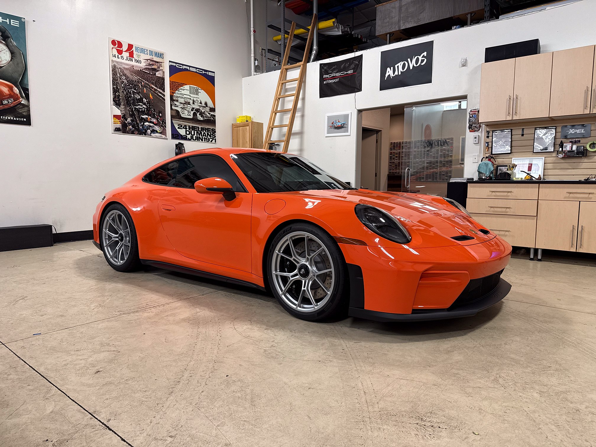 An orange sports car photographed inside the Auto Vos studio An orange sports car photographed inside the Auto Vos studio.