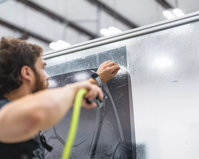 XPEL window film being prepared for installation